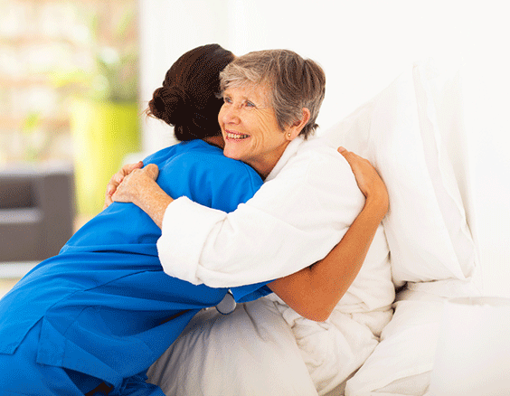 Happy Elderly Woman Hugging Foto Shutterstock