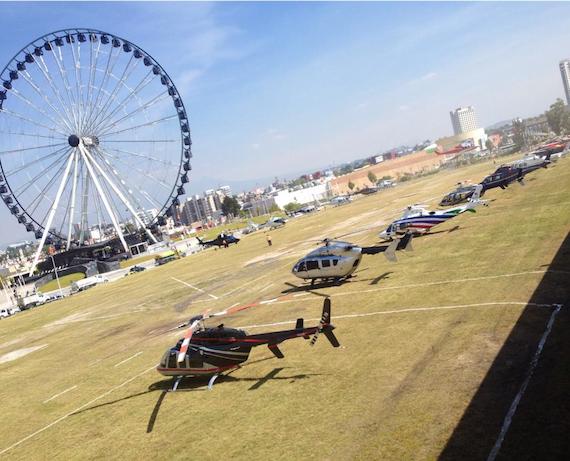 Al menos 16 helicópteros aterrizaron en Puebla para el IV Informe de Gobierno de Moreno Valle. Foto vía Twitter: @rochapress 