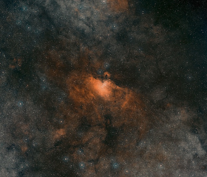 Imagen de la nebulosa del Águila procedente del sondeo “Digitized Sky Survey”. Foto: ESO