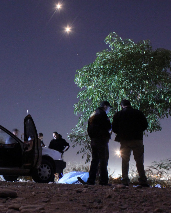 Agente de la policía municipal ejecutado en Culiacán, Sinaloa. Foto: Cuartoscuro