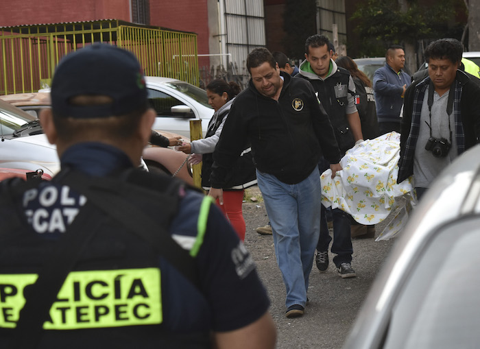 Dos Hombres Fueron Asesinados a Balazos En El Estacionamiento De La Unidad Fovisste Foto Cuartoscuro