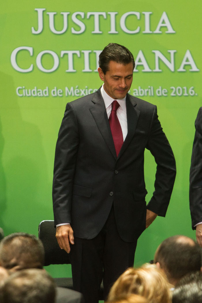 El presidente Enrique Peña Nieto, durante la ceremonia de Justicia Cotidiana en el Palacio Nacional. Foto: Cuartoscuro