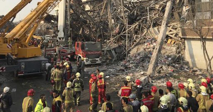 Iranian Firefighters Work at the Scene of the Collapsed Plasco Building After Being Engulfed by a Fire in Central Tehran Iran Thursday Jan a High rise Building in Tehran Engulfed by a Fire Collapsed on Thursday As Scores of Firefighters Battled the Blaze ap Photoebrahim Noroozi