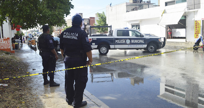 Policías acordonaron el área del asesinato. Foto: Cuartoscuro