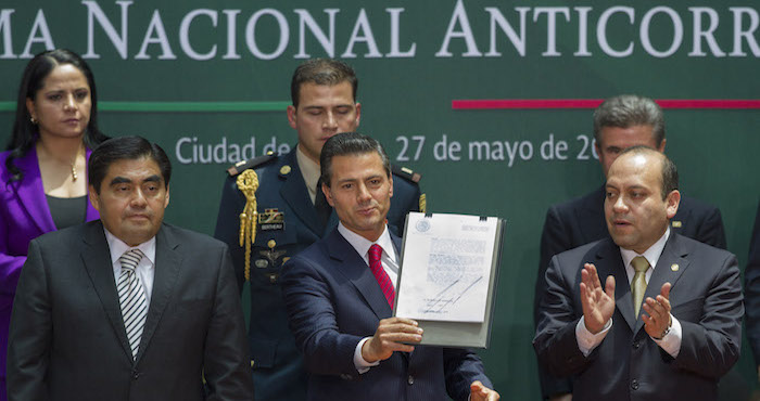 El Presidente Enrique peña Nieto durante la promulgación durante la promulgación de la Reforma Constitucional para crear el Sistema Nacional Anticorrupción, en el Palacio Nacional, en mayo pasado. Foto: Cuartoscuro