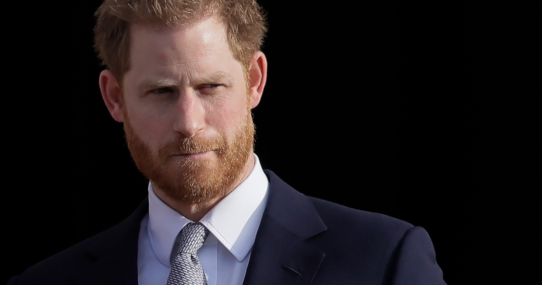 El príncipe británico Enrique llega a los jardines del Palacio de Buckingham en Londres. Foto: AP