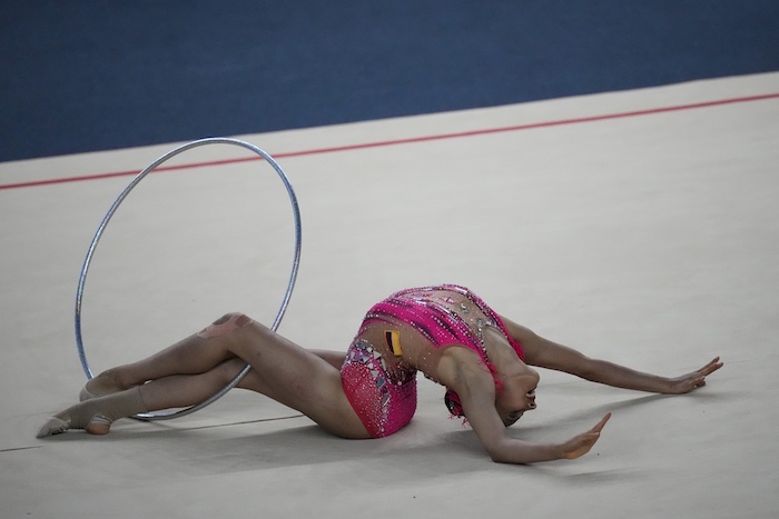 La colombiana Oriana Vinasc compite en la gimnasia rítimica, all-around individual, durante los Juegos Centroamericanos y del Caribe en San Salvador, el sábado 1 de julio de 2023.