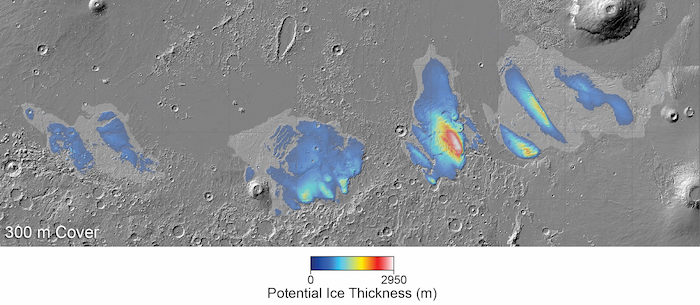 Superficie planetaria gris con manchas de colores. Las manchas son azules en el exterior, luego se vuelven verdes, amarillas, naranjas, rojas y luego blancas hacia el centro. Una escala en la parte inferior dice "Espesor potencial del hielo" y va desde 0 m (azul oscuro) hasta tres mil m (rojo-blanco).