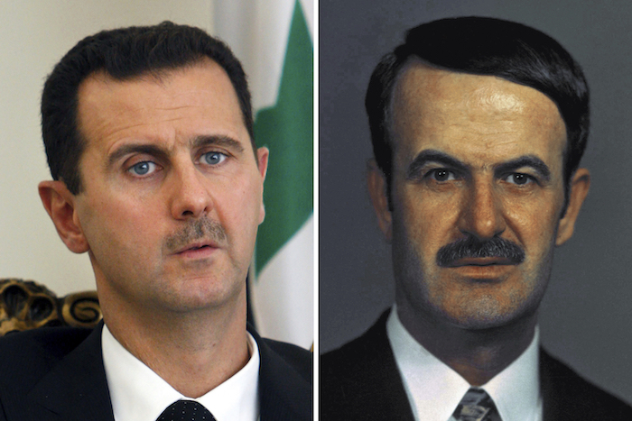 El Presidente sirio Bashar Assad y su padre, el expresidente Hafez Assad.